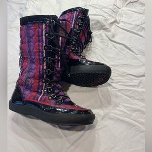 Faux fur lined lace up Coach boots